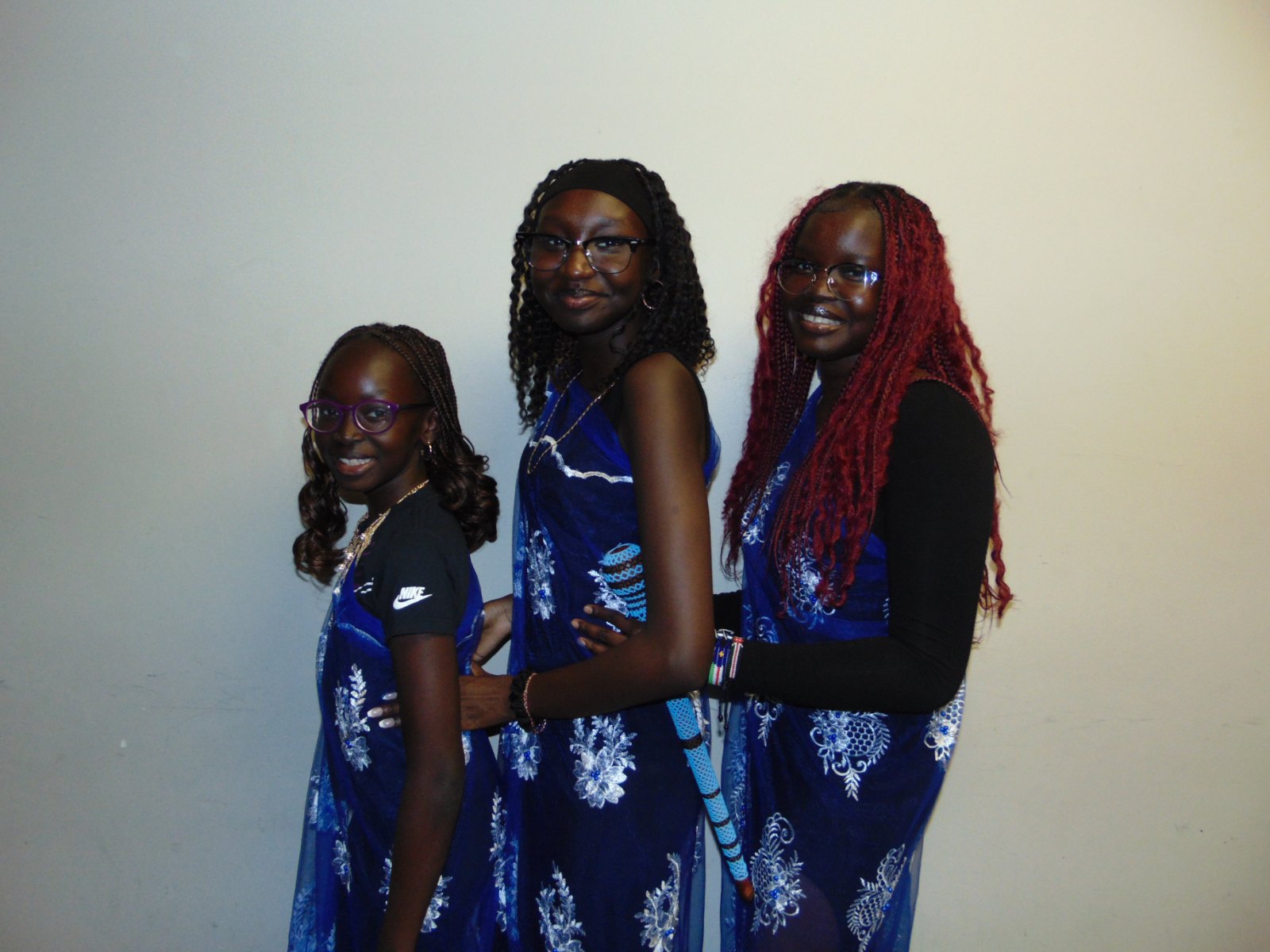 Three young Naath women in traditional dress